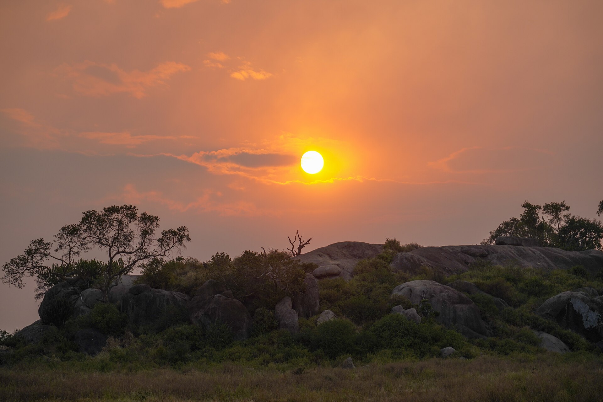 The sun setting over a rocky kopje in the Serengeti
